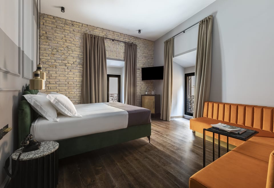 Deluxe Room, 1 King Bed (Chapter Double) | Premium bedding, minibar, in-room safe, individually decorated