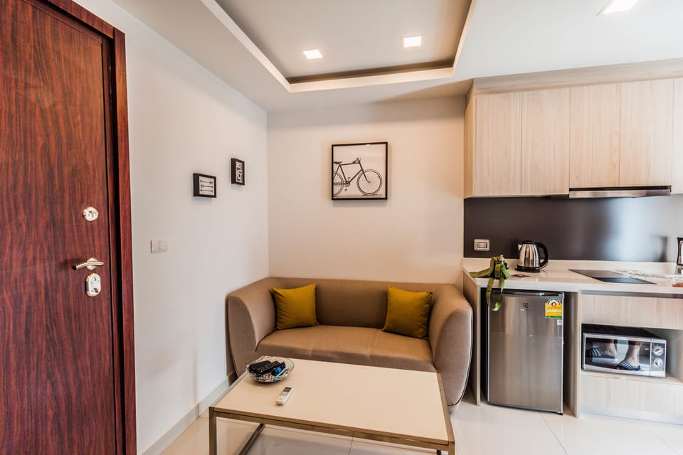 One Bedroom Apartment  | Living area | Flat-screen TV