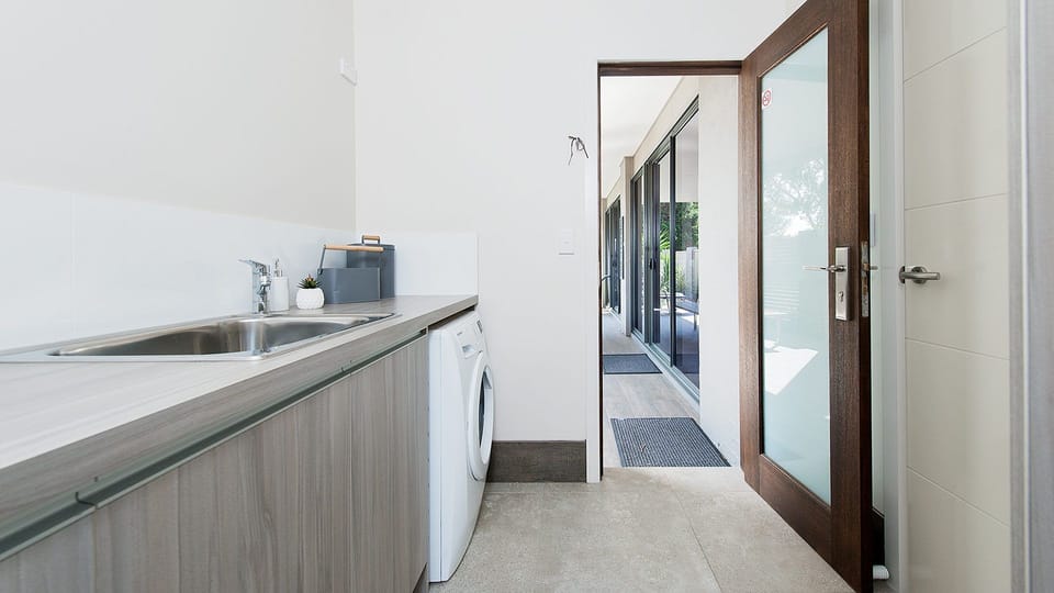 Laundry w access to Rear Deck