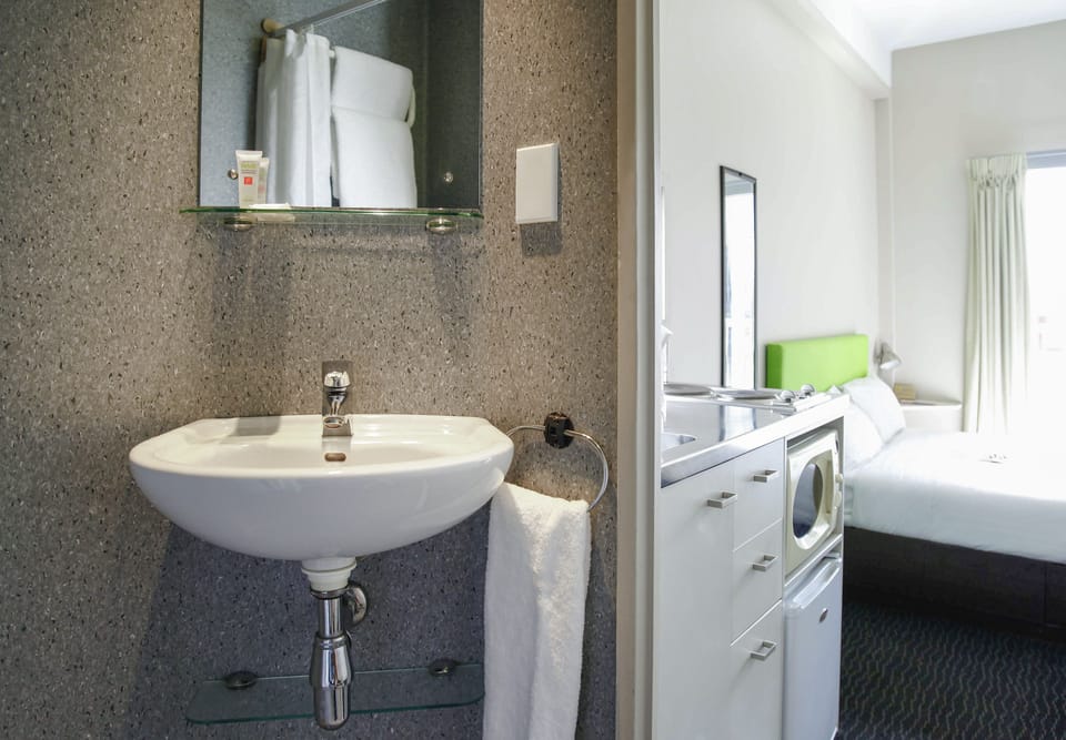 Shower, eco-friendly toiletries, hair dryer, towels