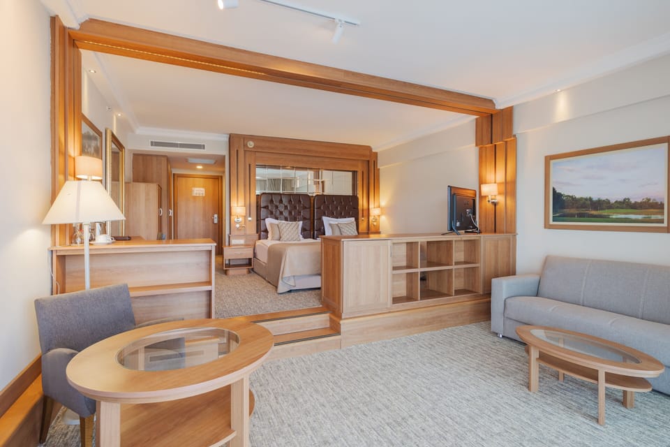 Senior Triple Room, Golf View | Free minibar items, in-room safe, free WiFi