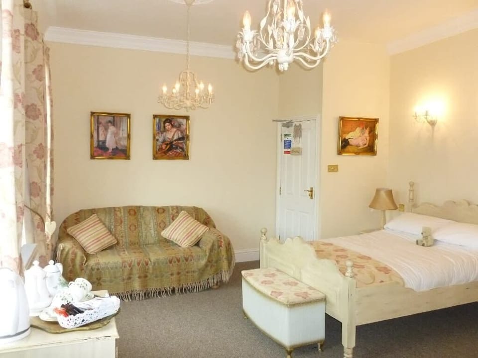 Family Room | Iron/ironing board, bed sheets