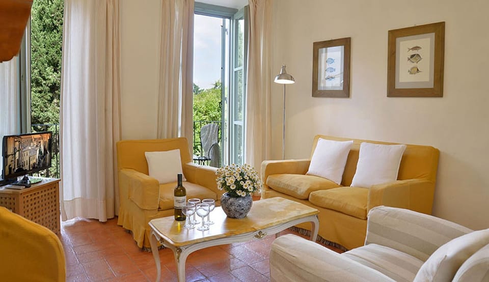 The living room has a terrace and a balcony