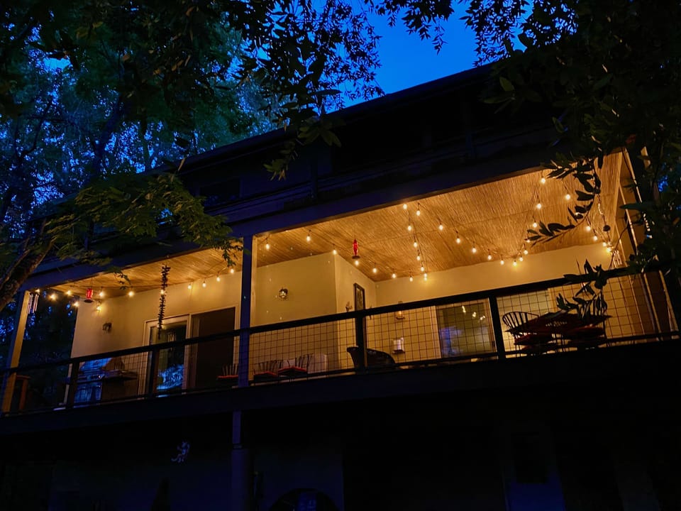 View of deck from creek level... lights are dimmable to suit your moods.  :)
