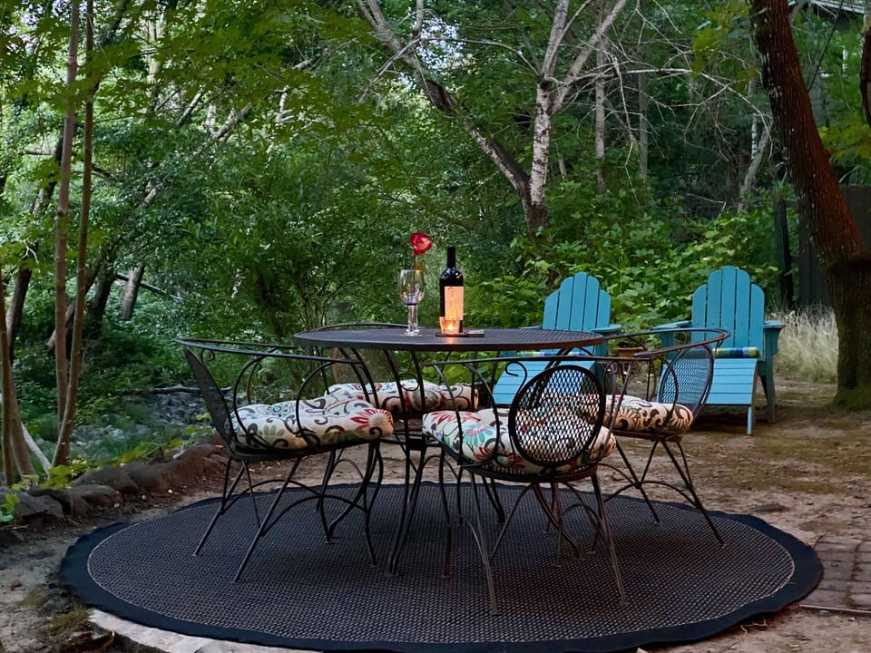 Dine alfresco next to the creek...  with your favorite bottle of wine.

