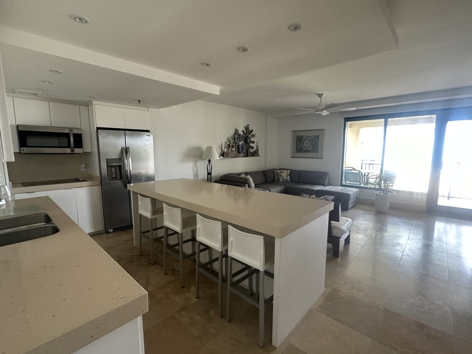 Quartz table with 8  seats overlooking the sea.