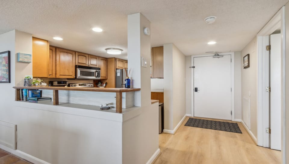 View from dining to front door and kitchen