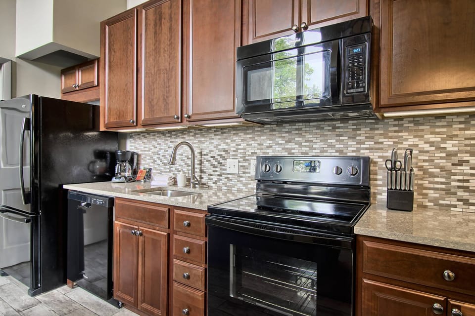 Kitchen - Fully remodeled with everything you need to cook and dine.  All new appliances.  Mr. Coffeemaker and coffee setups provided.