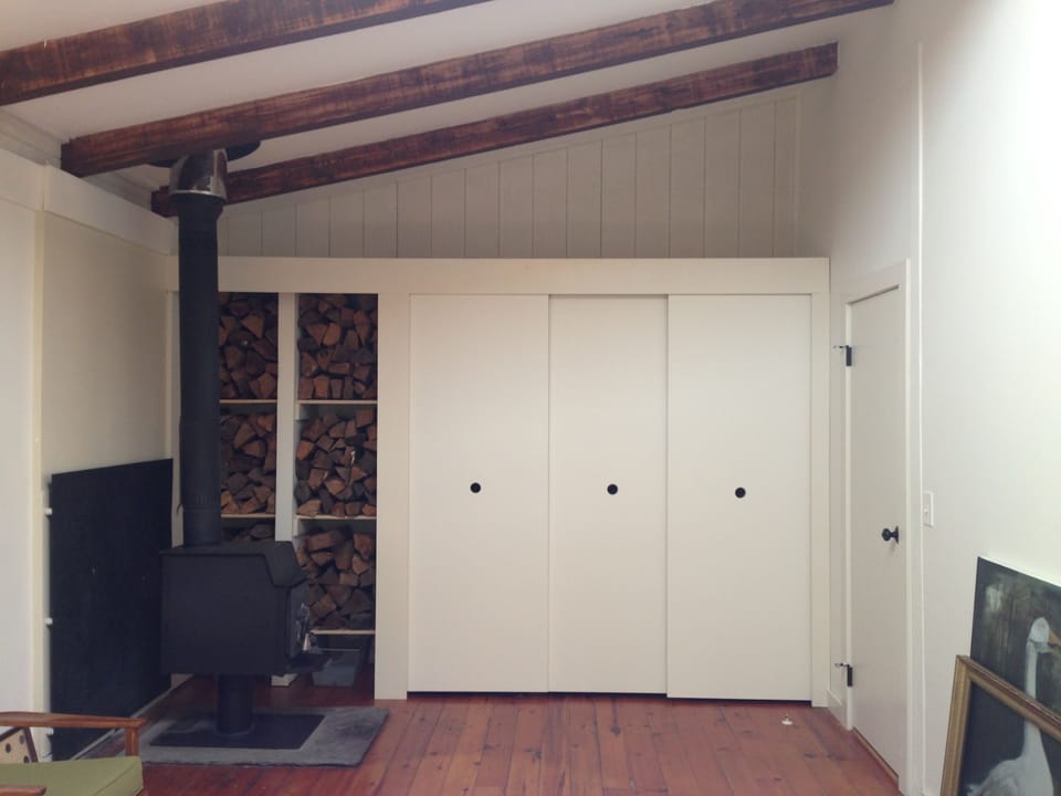 Bedroom #2 has queen bed, stove, desk, skylight, sliding glass door and deck.