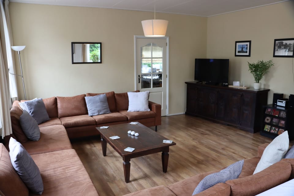 The long main room with its high ceilings - sitting room for 12 persons.