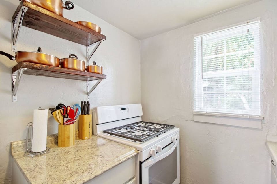 Stove with cooking utensils