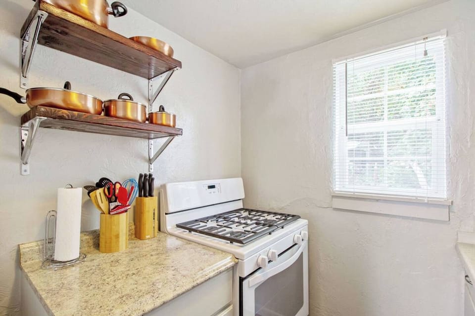 Stove with cooking utensils