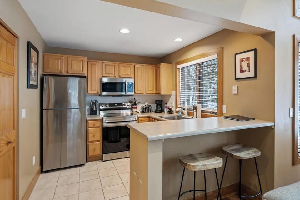 Open concept living - Everyone gathers around the kitchen!  With the living room just off this space, there is plenty of room for family and friends to enjoy each other.