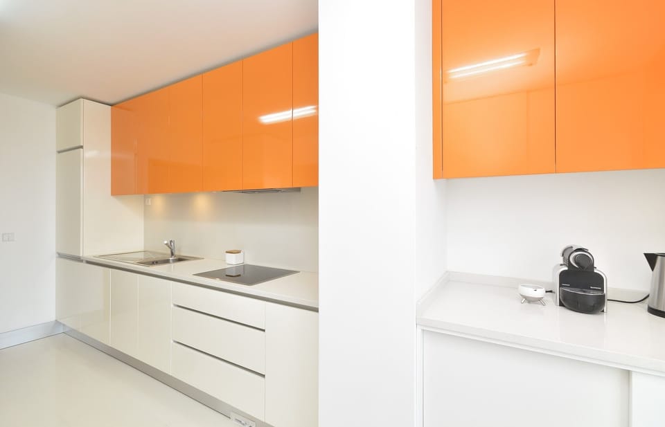 Fully equipped kitchen and laundry room.
