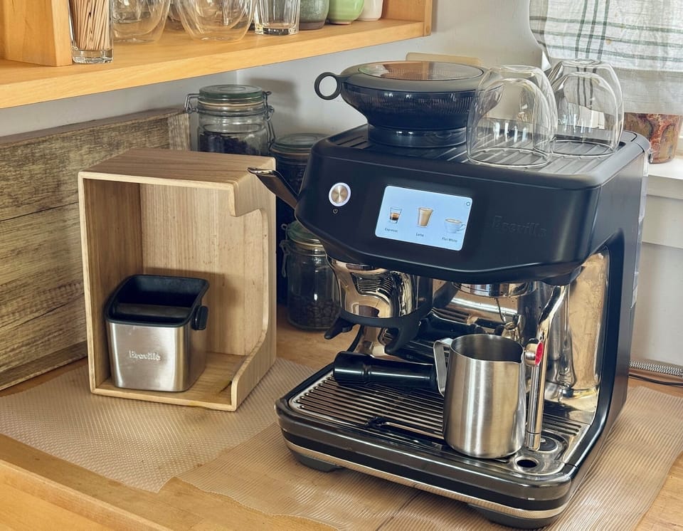 Breville espresso maker with instructional display, other coffee makers, beans