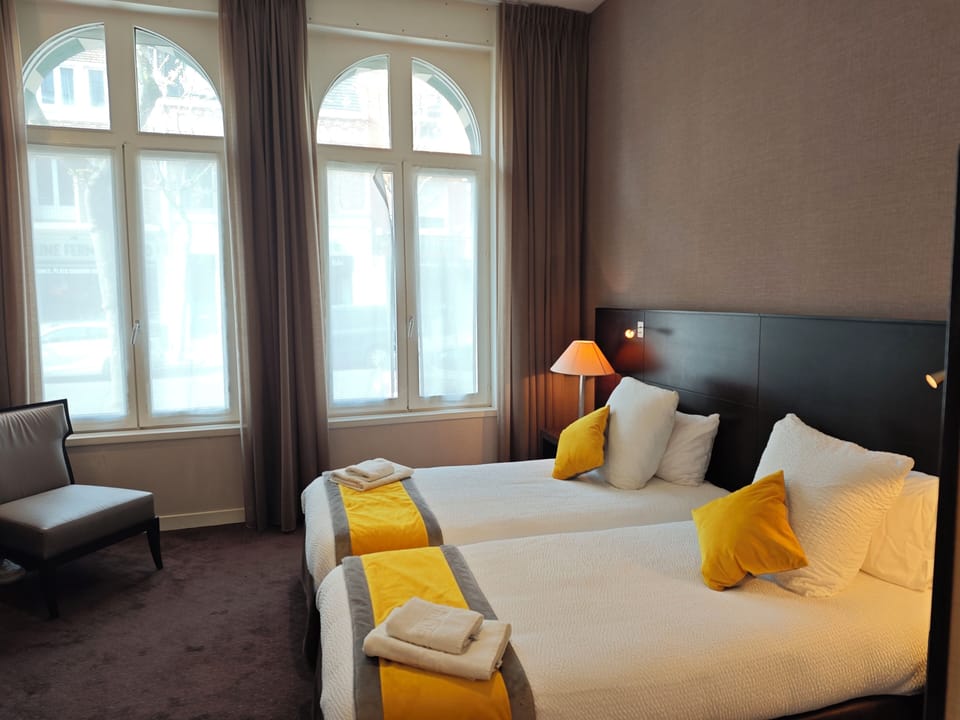 Twin Room (Mimosa) | Desk, blackout drapes, soundproofing, iron/ironing board