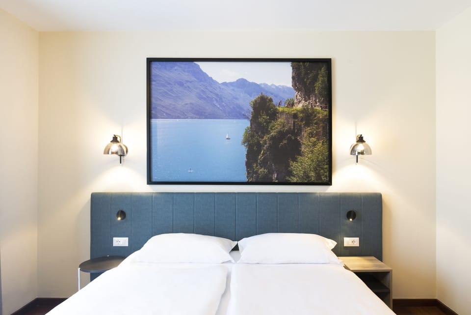 Classic Double Room | Minibar, in-room safe, desk, laptop workspace