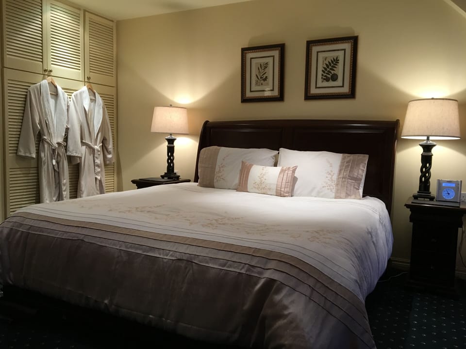 Master ensuite bedroom, Boll & Branch linens and Merino lambswool luxury pillows