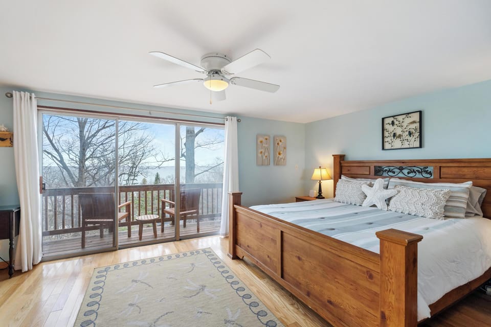 Attached deck with views of Lake Michigan and M-119 (Tunnel of Trees).