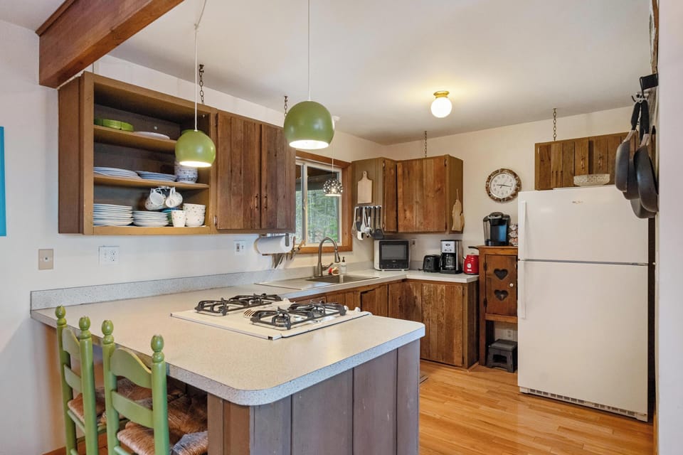 Kitchen.  Drip and Kuerign coffee maker. Microwave.