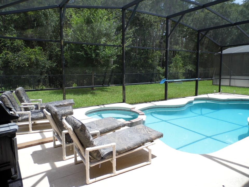 4 Luxury recliner Sun Loungers overlooking the Pool and Spa