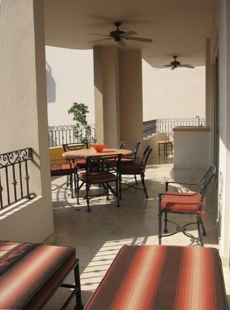 Spacious balcony features a small fridge and propane bbq (not seen)