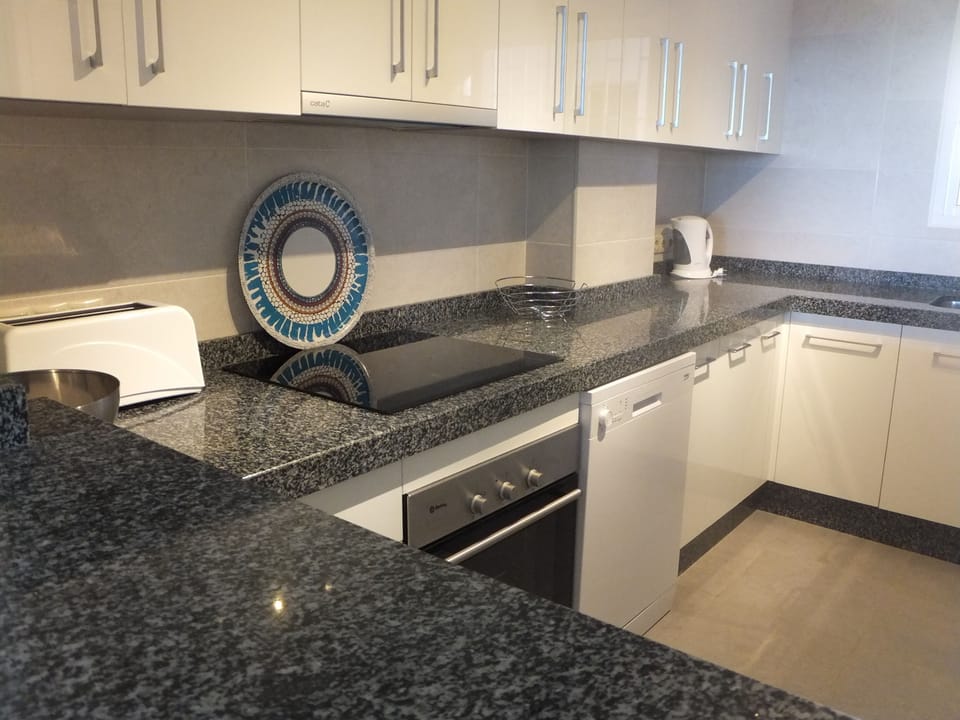contemporary fitted kitchen with granite worktops, dishwasher & washing machine