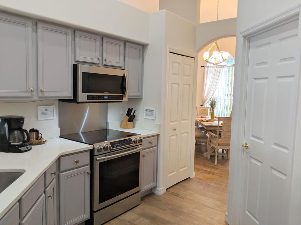 Convection oven with fast boil burners, MW, pantry closet and laundry room