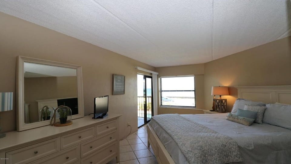 See how spacious the queen oceanfront bedroom is.  Direct access to balcony.  