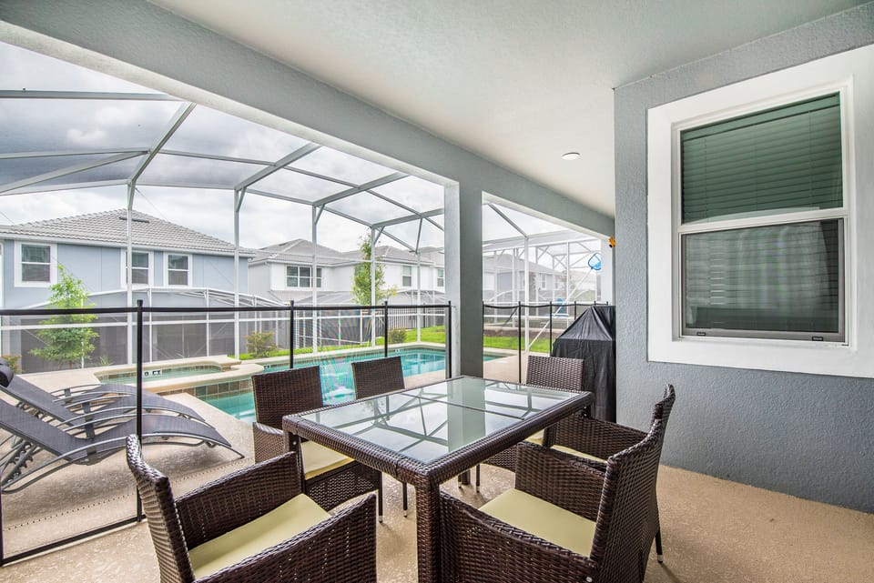 Porch by the pool and jacuzzi.