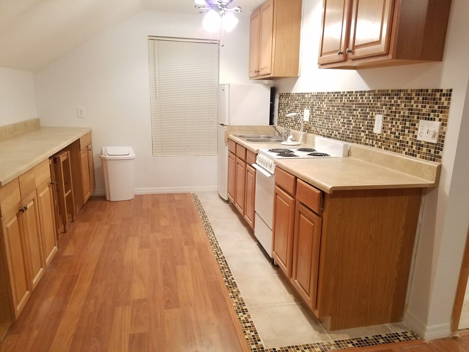 Upstairs studio kitchen - Stove/Oven and Fridge & plenty of countertop