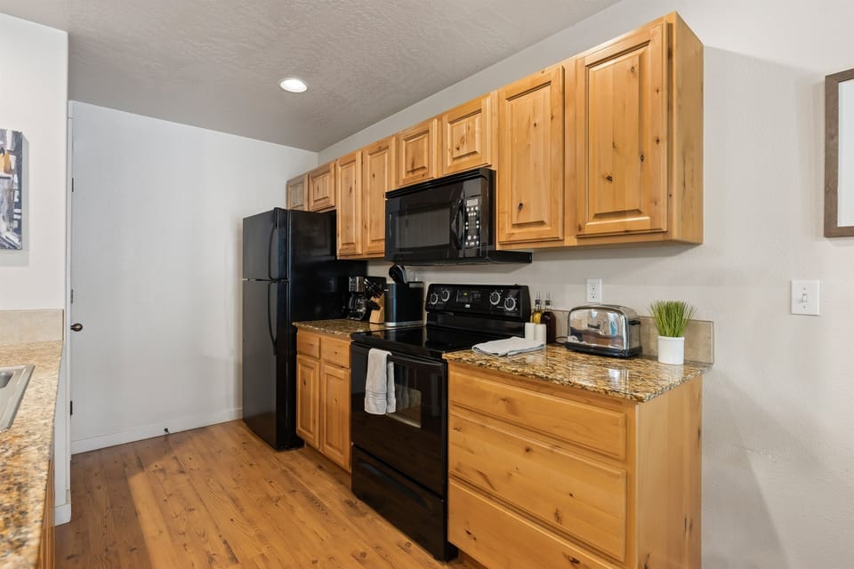 Closer look at the fully stocked kitchen.