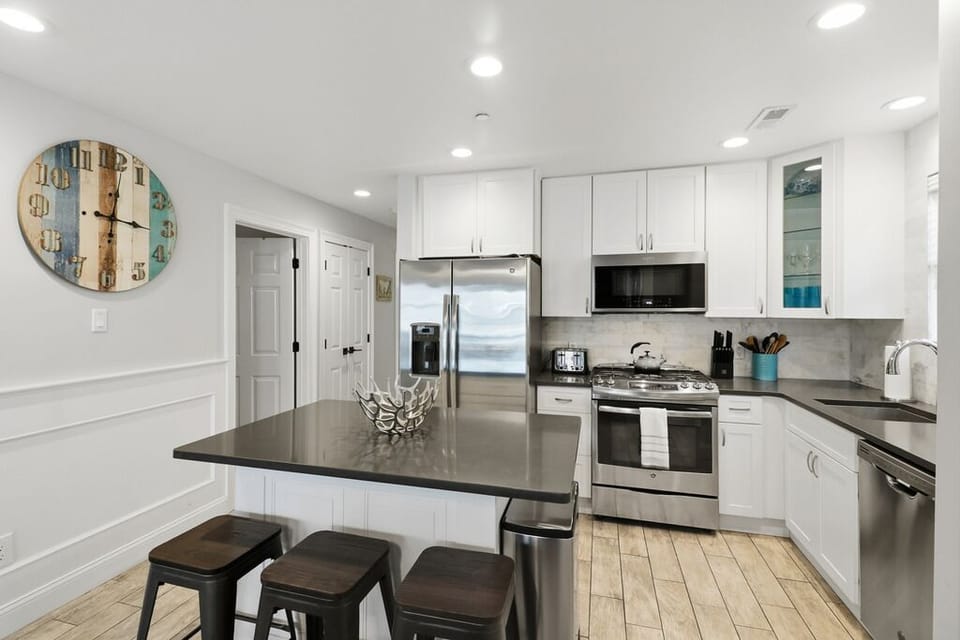 Modern kitchen island which can seat 3
