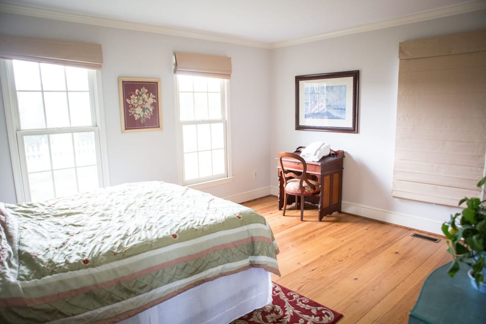 Enjoy the dining room, sitting room and porch swing at the Manor house.
