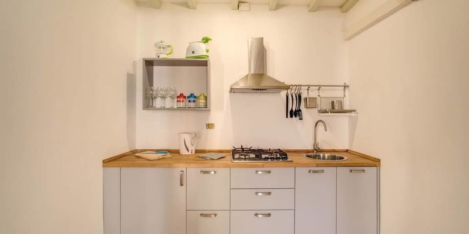 Apartment, 3 Bedrooms | Private kitchenette | Fridge, stovetop, espresso maker, cookware/dishes/utensils