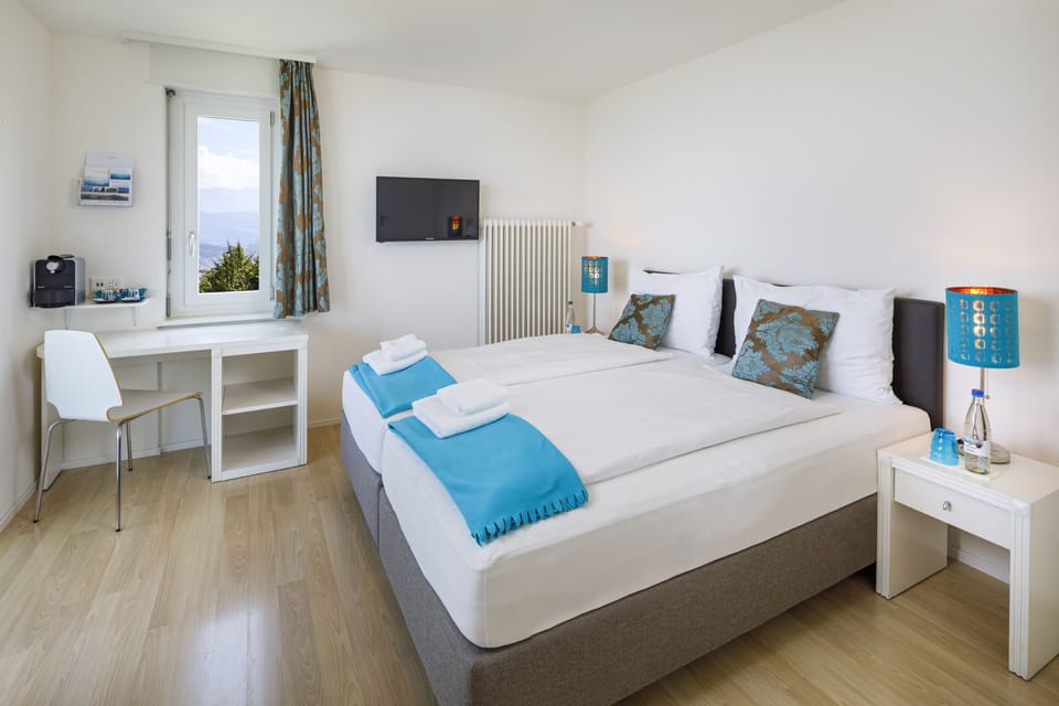 Double Room | Desk, blackout drapes, free WiFi, bed sheets