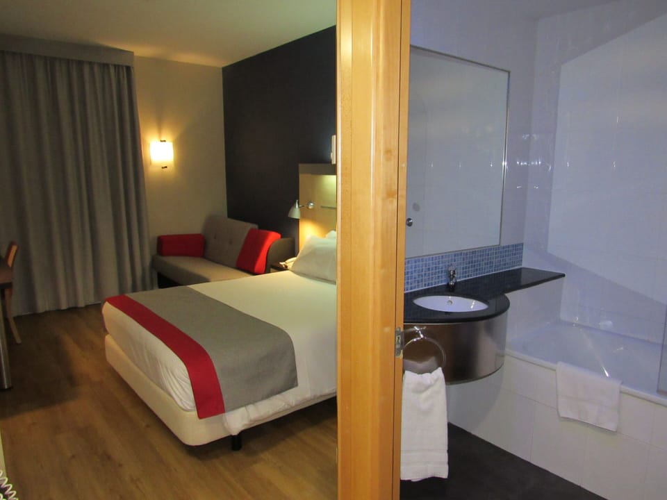 In-room safe, individually furnished, desk, free cribs/infant beds