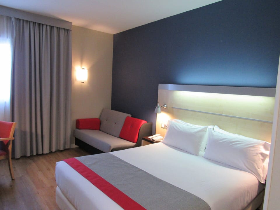 In-room safe, individually furnished, desk, free cribs/infant beds