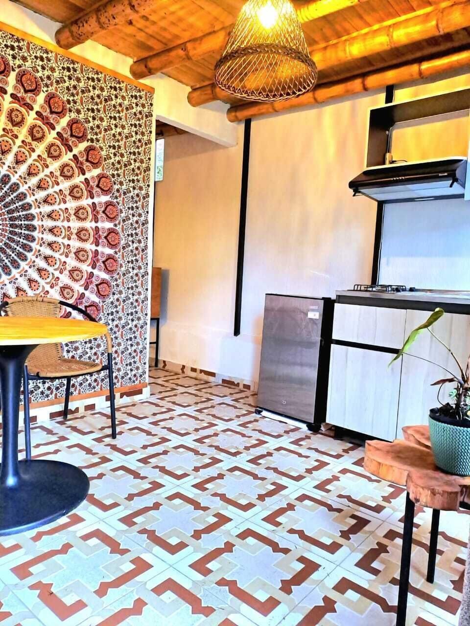 Comfort Chalet, 1 Double Bed, Garden View | Private kitchen | Dining tables