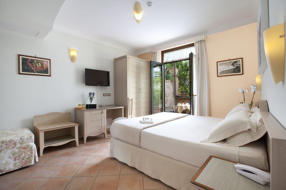Down comforters, memory foam beds, minibar, in-room safe