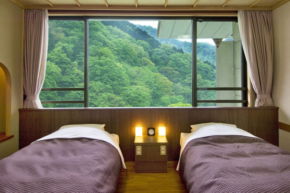 Room with Tatami Area | In-room safe, bed sheets