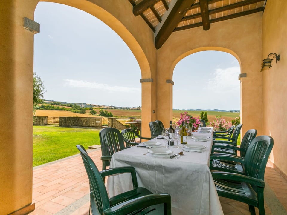 Sky, Furniture, Property, Table, Chair, Plant, Shade, Tableware, Building, Outdoor Furniture