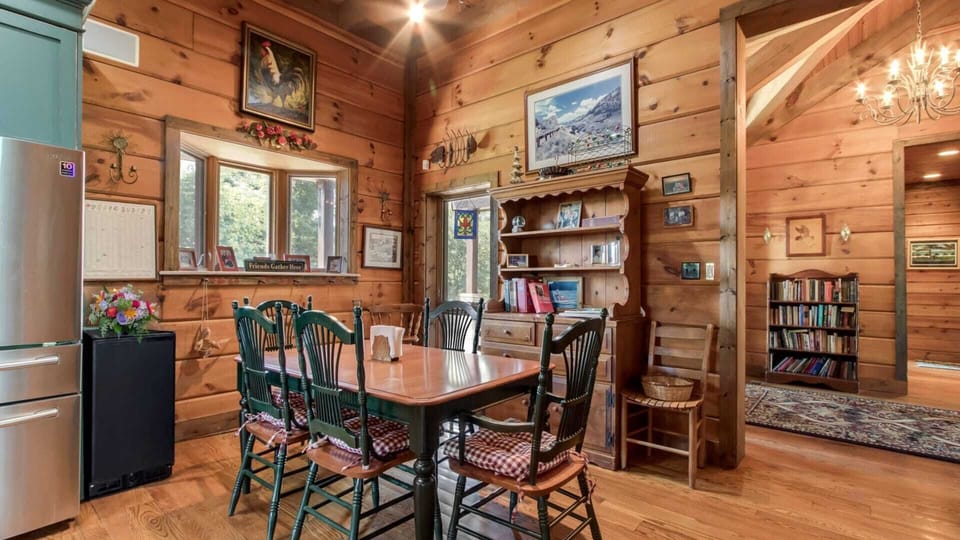 Next to the kitchen is another dining table; great for family meals or playing games!