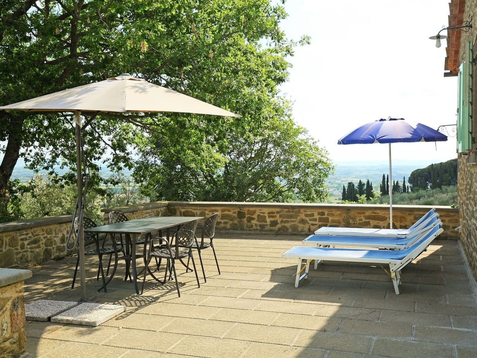 Umbrella, Furniture, Table, Property, Shade, Patio, Room, Tree, Outdoor Table, Building