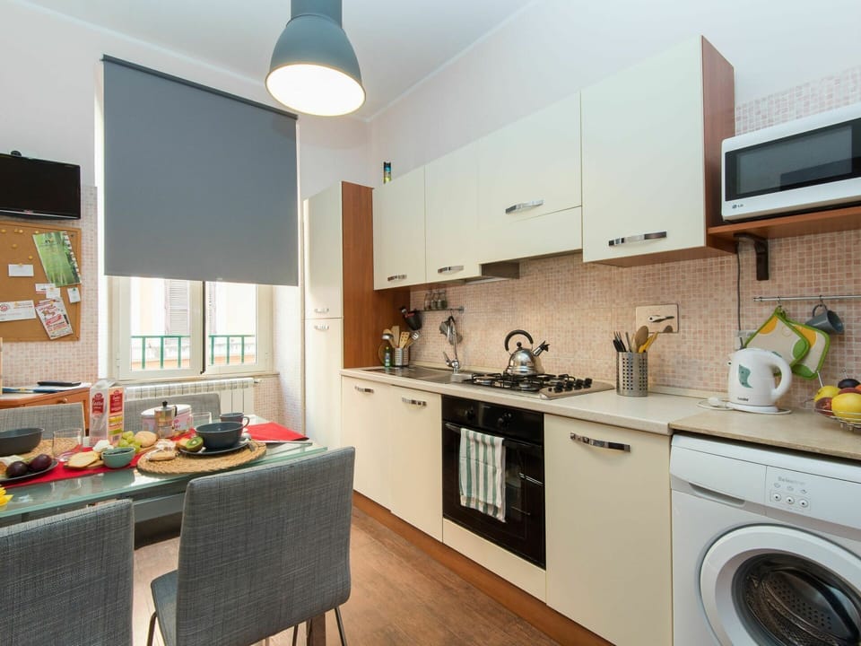 Cabinetry, Furniture, Countertop, Property, Kitchen Appliance, Kitchen Stove, Laundry Room, Kitchen, Lighting, Interior Design
