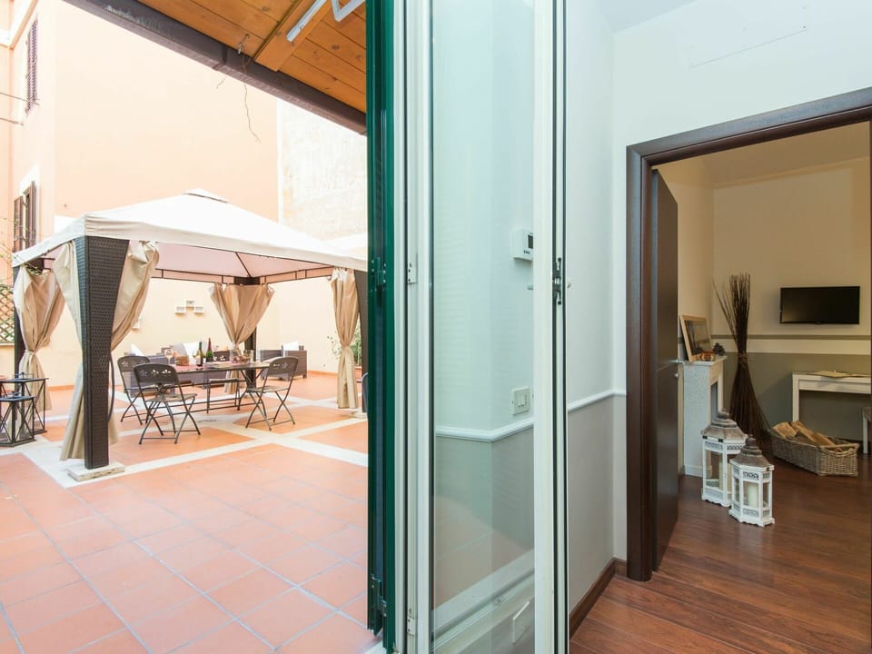 Furniture, Building, Wood, Interior Design, Outdoor Furniture, Shade, Door, Floor, Flooring, Comfort