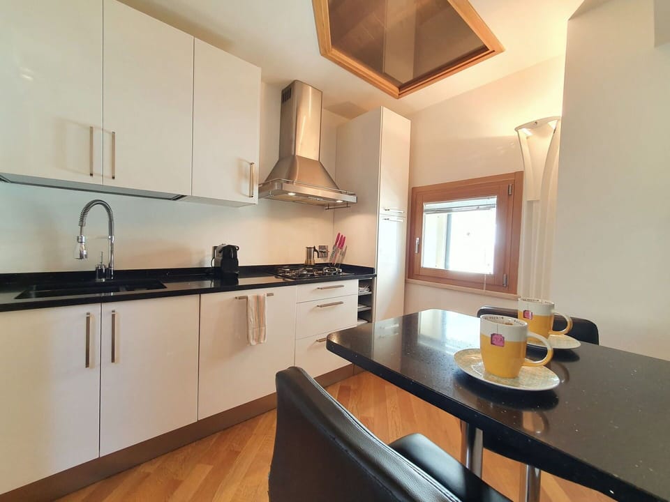 Kitchen Appliance, Kitchen, Countertop, Major Appliance, Interior Design, Flooring, Wood, Furniture, Cabinetry, Floor