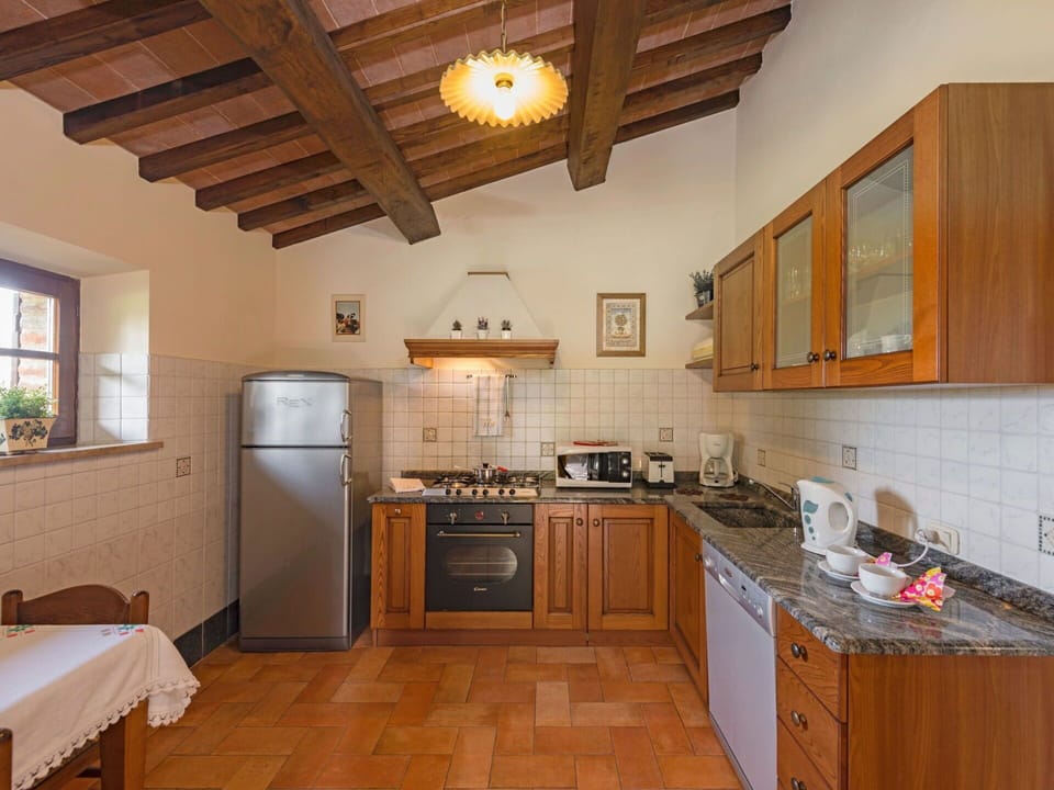 Countertop, Property, Room, Furniture, Cabinetry, Kitchen, Building, Wood Flooring, Ceiling, Floor