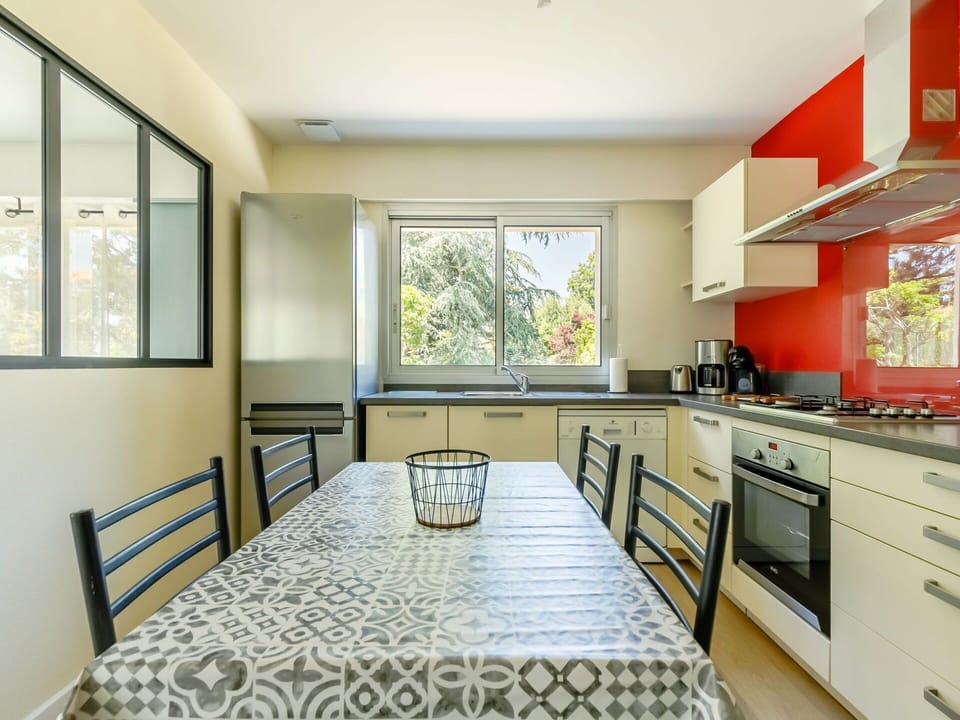 Cabinetry, Property, Countertop, Window, Building, Interior Design, Flooring, Floor, Kitchen Stove, Kitchen Appliance