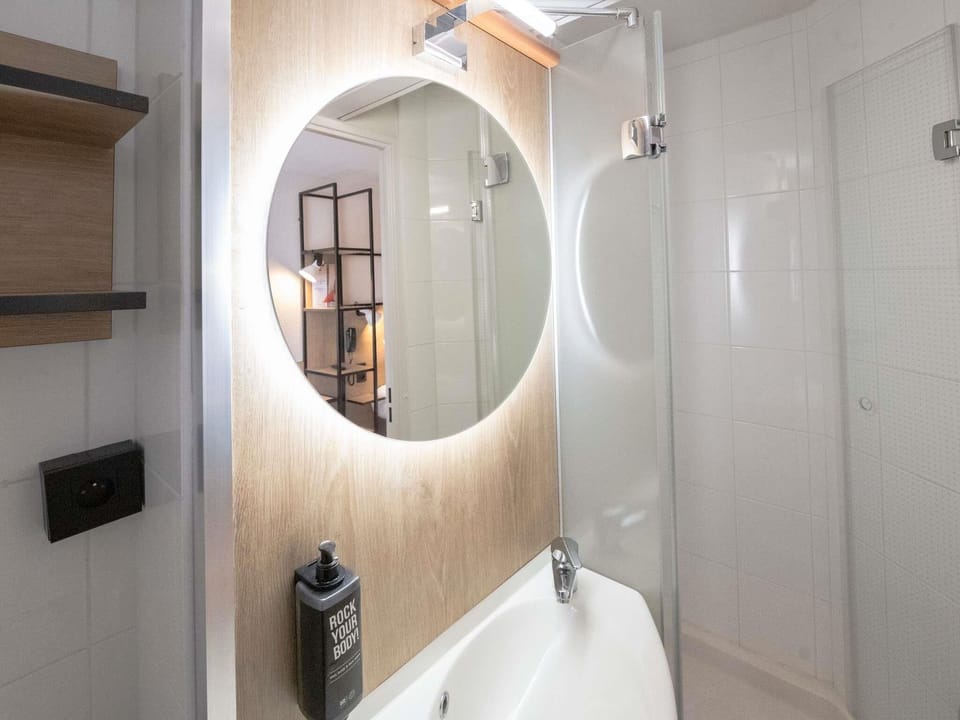 Shower, eco-friendly toiletries, hair dryer, towels